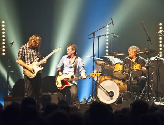 Band of Friends live at Avoine Zone Blues Festival, 2012. Marcel Scherpenzeel (guitar), Gerry McAvoy (bass), Ted McKenna (drums). SUS-150331-114856003