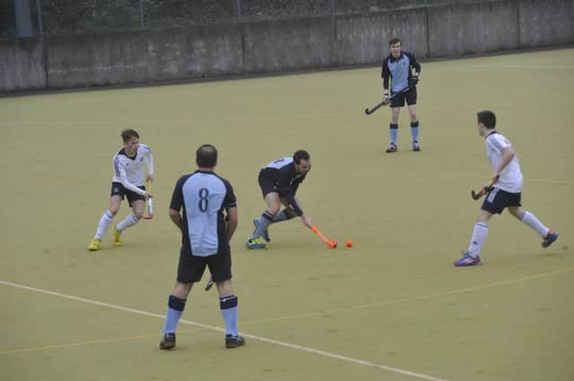 Action from South Saxons' 4-1 victory at home to East Grinstead III on Saturday. Picture by Simon Newstead (SUS-150328-233422002)