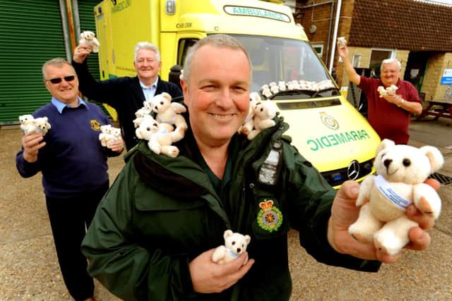 Burgess Hill District Lions supply trauma teddies for the ambulances that work out of Burgess Hills Ambulance Station. Back - Lions Alan Ranger, President John Gee and Tony Parris, Frnt Roy Nightingale (SECAM) Pic Steve Robards SUS-140322-215009001