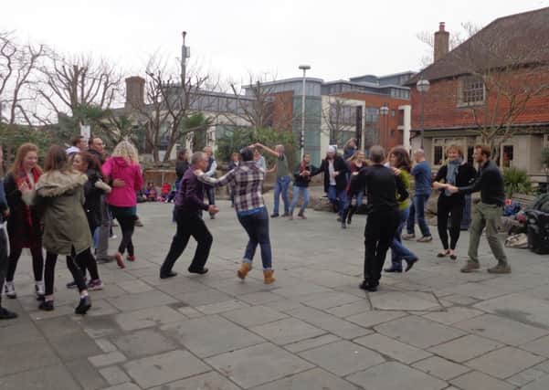 Salsa flashmob in Horsham SUS-150104-104548001