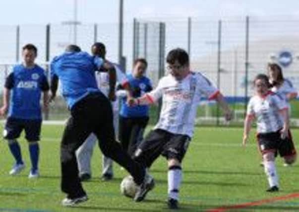 Action from Albion in the Communities Downs Syndrome football event. Picture by Paul Hazlewood