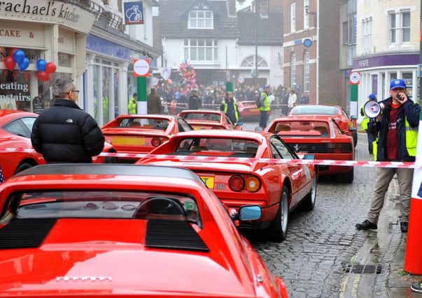 Millions of pounds worth of Ferrari's in fire drama at Horsham Piazza. 03/04/15. Pic Steve Robards SUS-150304-143805001