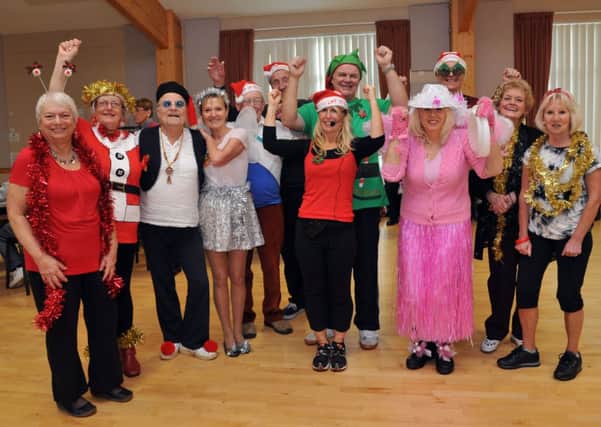 Members of this cardiac fitness group, enjoying their Christmas party at the Angmering Community Centre in 2013, are among those who use the centres café, which is now seeking volunteers