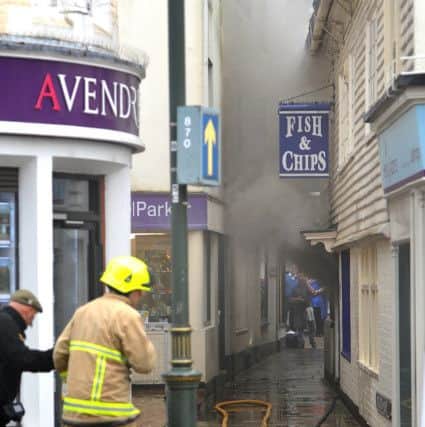 Piazza Italia Horsham, 03-04-15. Fish and Chip shop fire. Pic Steve Robards SUS-150404-161942001