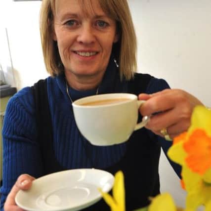 Alice Rendle, director of Edgcumbes, in Ford Lane, Ford, having a sip of her latest brew SUS-150904-140748001
