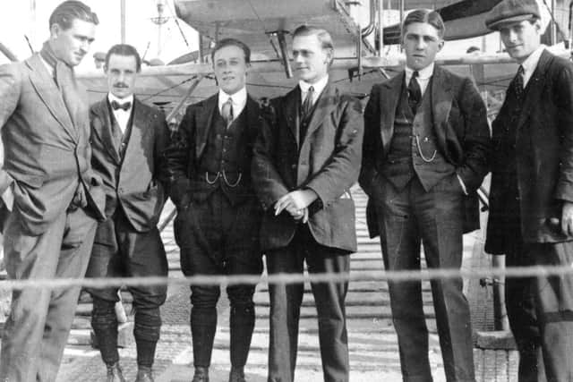 Arthur Taylor (wearing bow-tie), proprietor of the Beach Hotel, with Cecil and Eric Pashley (centre) on their arrival at Bognor, May 26, 1913