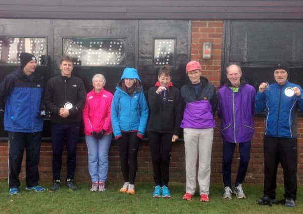 Chichester medal winners shelter from the weather as winter ends
