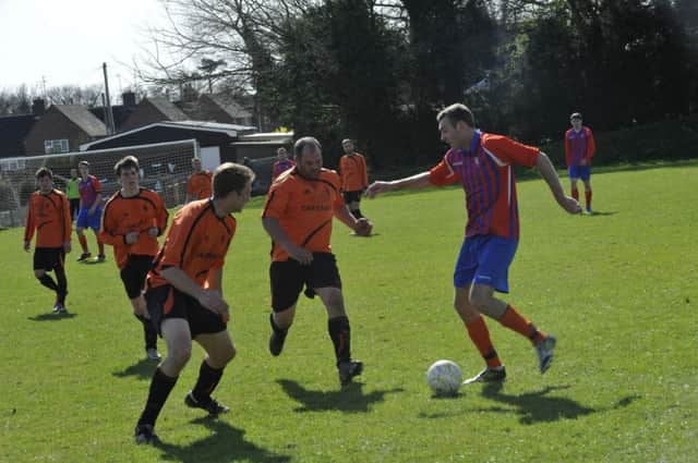 Action from Battle Baptists' 1-0 win over Iden on Saturday. Picture by Simon Newstead (SUS-151104-212950002)