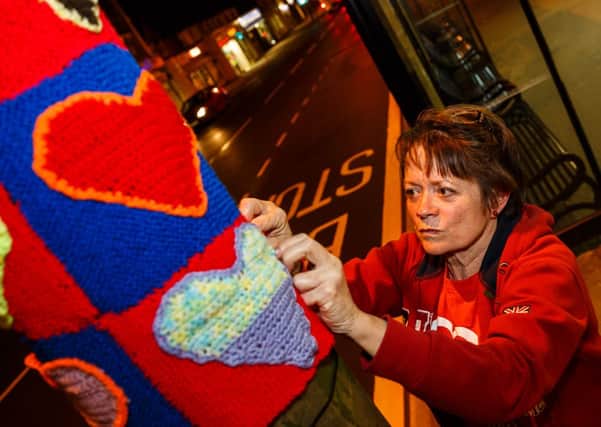 Yarn bombing in action