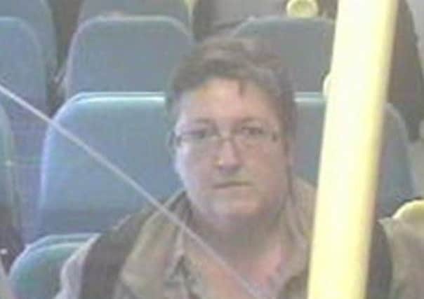 Detectives issued this photo of a woman they wish to speak to in relation to a theft on a train