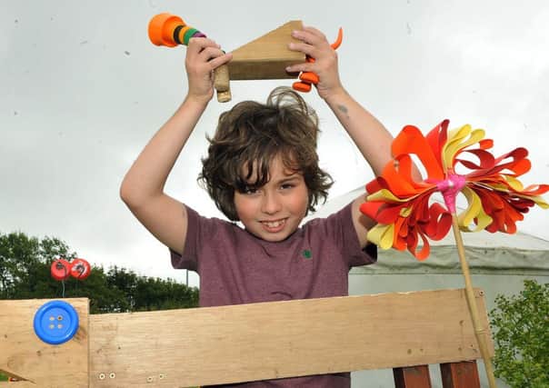 Toby Bowley with his creation from a Hands On workshop in the yurt at Adur Outdoor Activities Centre S22516H14