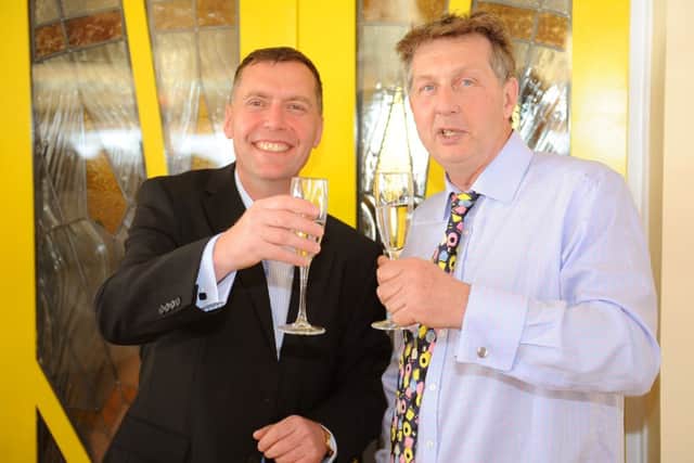 WH 160414 Opening of Southern Pavilion, on Worthing pier, after three years of being vacant. Owners Richard Bradley left and Phil Duckett. Photo by Derek Martin SUS-140417-001304001