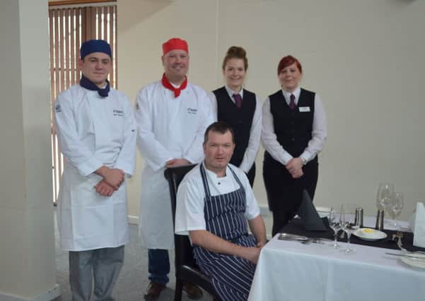 From left: Trainee chefs Mark Nicholls and Marc Smith, front of house Emily Savage and Hayley Greco and head chef Russell Williams