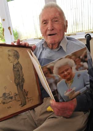 John Cole, celebrates his 100th birthday at his nursing home in Littlehampton  PHOTO: Stephen Goodger SUS-150421-104341001