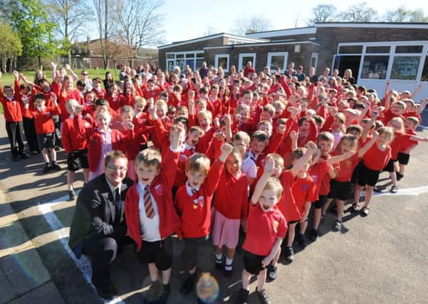 Head teacher, Andrew Simpson pictured with pupils at Arundel CE Primary School