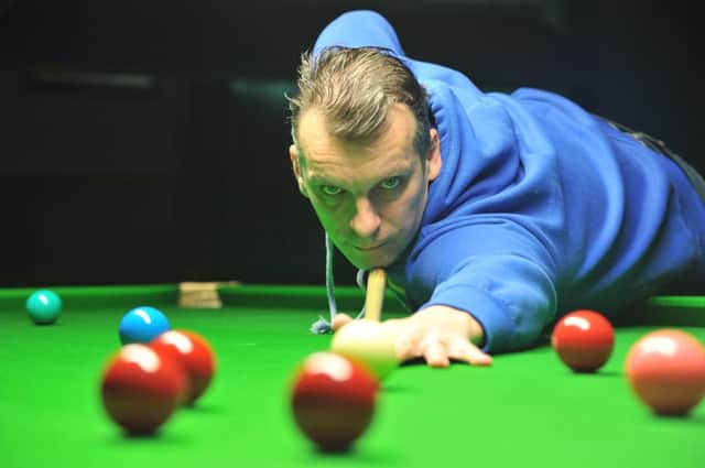 Mark Davis booked his place in the World Snooker Championship with a 10-3 victory over Ken Doherty
