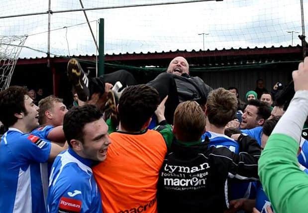 Hillains players celebrate winning title at Carshalton. Picture by Emily Hodgkinson SUS-151204-223041001
