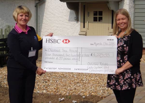Christine Knight, the 2014 Lady Captain of Cottesmore Golf and Country Club handed over a cheque for £4,203.55 to Jayne Todd, community fundraiser for Chestnut Tree House Childrens Hospice. SUS-150414-152315002