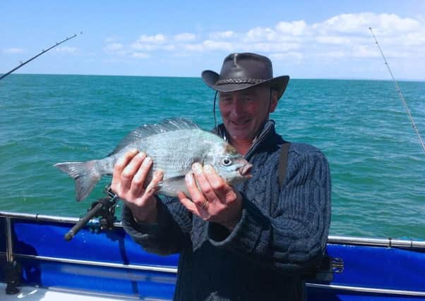 Tim Macpherson, director of the Angling Trust Sussex Marine Region, fishing for black bream in the Kingmere