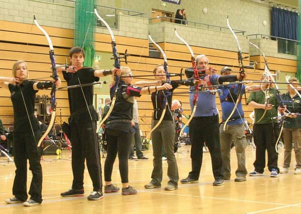 Cuckfield Juniors on the shooting line: Aoife Rice (far left) and Chris Jeffrey (second left)