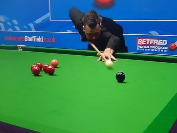 Bexhill snooker star Jimmy Robertson in action at the Betfred World Championship (SUS-150418-195039002)