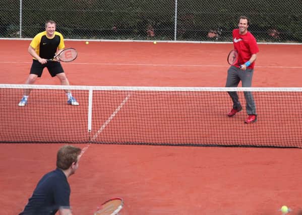 Greg Rusedski in action at Storrington Tennis Club