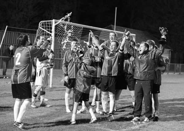 Elmer celebrate winning one of the cup competitions that the CWSSFL has run over the years