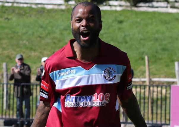 Marlon Patterson celebrates during Hastings United's 2-1 win over Faversham Town. Picture courtesy Scott White