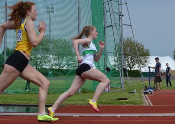 Caitlin Moore (in white and green) starred at Hillingdon / Picture by Lee Hollyer