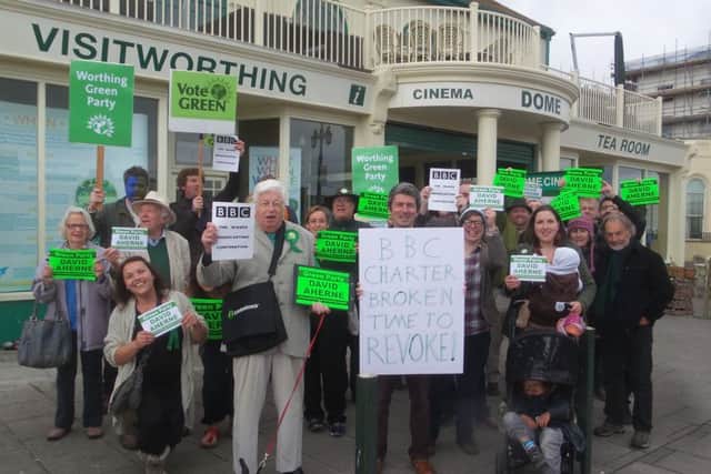 Green supporters gather outside Worthing Dome