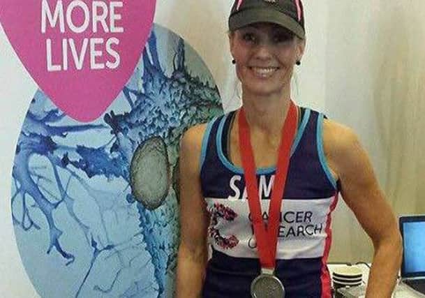Samantha Ridley with her London Marathon medal