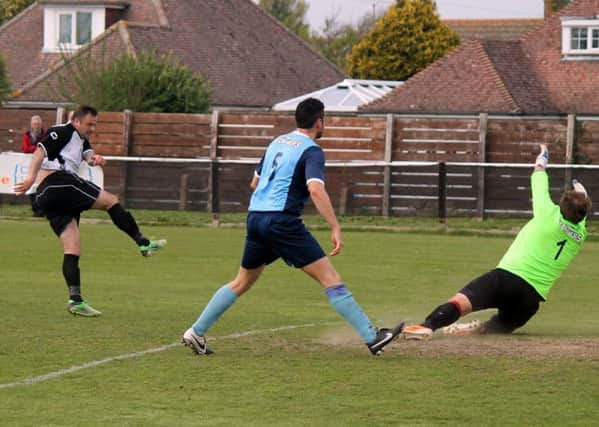 Rob Wimble hits one of the eight  Picture by Roger Smith