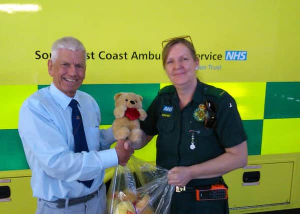 Horsham Lions Club donates soft toys to the Horsham Ambulance Centre SUS-150427-122400001