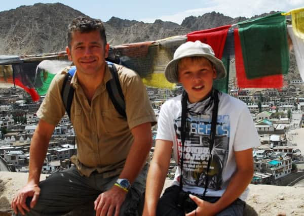 Paul Carruthers calling for donations to help Nepal after earthquake struck with his son Joseph in India (submitted). SUS-150428-093928001