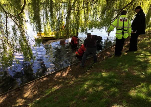 Fire and Rescue checking lake at Brookland Pleasure Park Worthing for body of Mark Manning SUS-150428-123241001