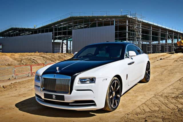 A Rolls-Royce Wraith on the new logistics centre in Bognor Regis