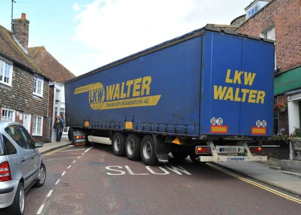 17/9/10- Foreign lorry blocking Lower Street in Rye after being towed out from under the Landgate Arch.