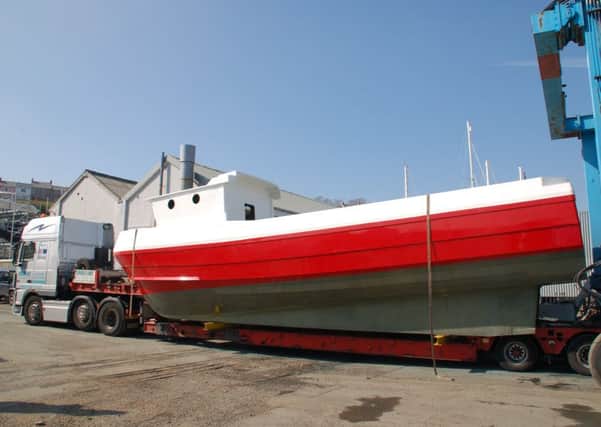 The 12m hull was transported from Wales to Shoreham by road