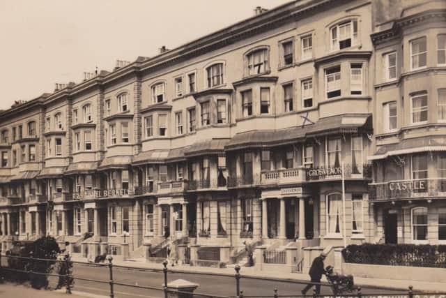 A view of 85-95 Marine Parade around 1930, with the names of the Berkeley, the Grosvenor and the Castle displayed above the ground floors of the three hotels