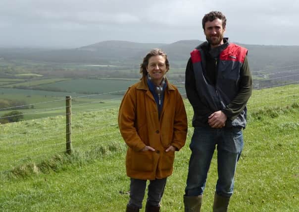 Annie Brown of Lower Paythorne and Purching Manor Farms, Fulking, is one of five finalists of the Farming & Wildlife Advisory Groups Silver Lapwing Award. Pictured with farm manager David Ellin - photo contributed by  the Farming & Wildlife Advisory Group