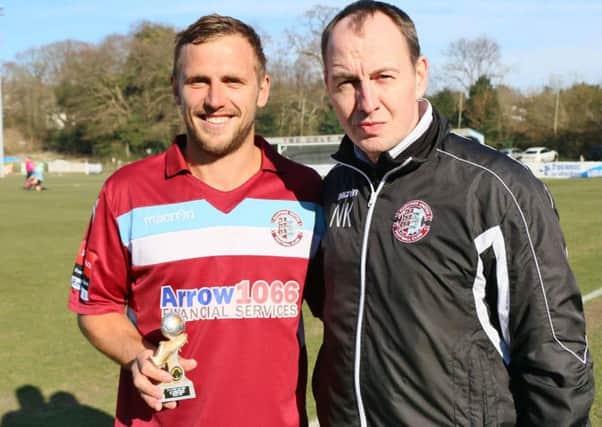 Departed Hastings United manager Nigel Kane (right) with midfielder Sam Adams. Picture courtesy Joe Knight