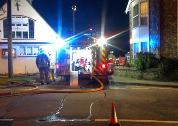 Fire crews at the scene in Orchard Street, Chichester SUS-150305-214645001