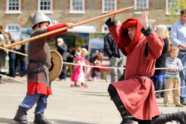 Jack Labelle-Hughes and Glenn Collis from 

Raven Tor, a Multi-Period Living History Group. 

Medieval Midhurst festival 

Picture by Allan Hutchings