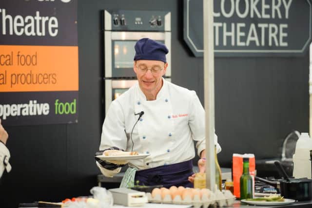 Chef, Rob Silverstone, cooking. 

Food and Folk Festival at the Weald and Downland Museum.

Picture by Allan Hutchings