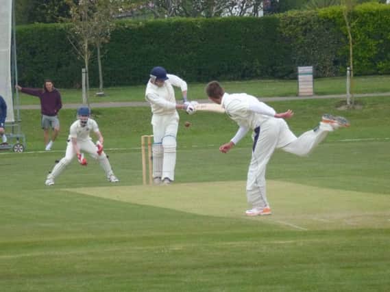 Shawn Johnson tries to work the ball off his legs during Bexhill's eight-wicket win at home to Hellingly on Saturday. Picture by Simon Newstead (SUS-150305-223014002)