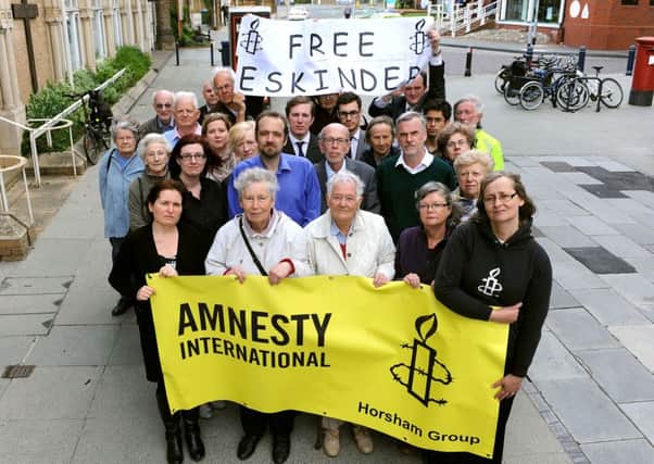 Horsham Amnesty group with Horsham journalists highlighting World Press Freedom Day near the County Times office. Pic Steve Robards SUS-150605-091127001