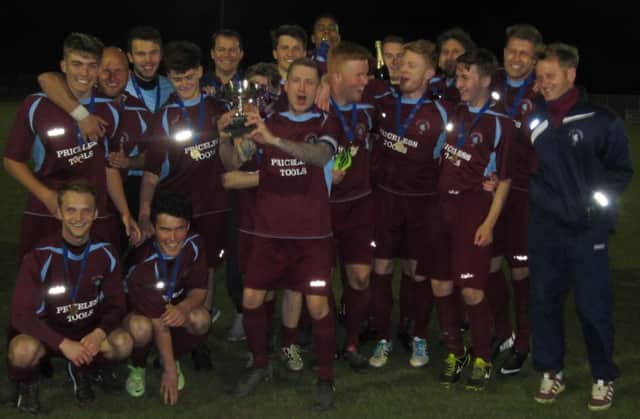 Little Common Football Club celebrates winning the Sussex County Football League Reserve Section Challenge Cup