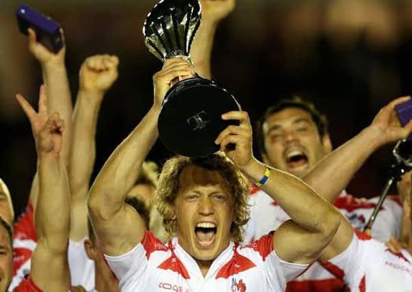 Billy Twelvetrees lifts the European Challenge Cup