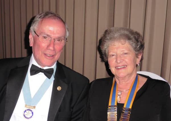 Rotary Club of Senlacs President, Christine Folley, with District Governor Martin Williams. SUS-150705-121324001