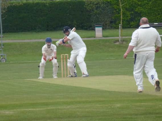 James Walker batting for Bexhill during their Gray-Nicolls Sussex T20 Cup victory at home to Hellingly last weekend. Picture by Simon Newstead (SUS-150305-223125002)